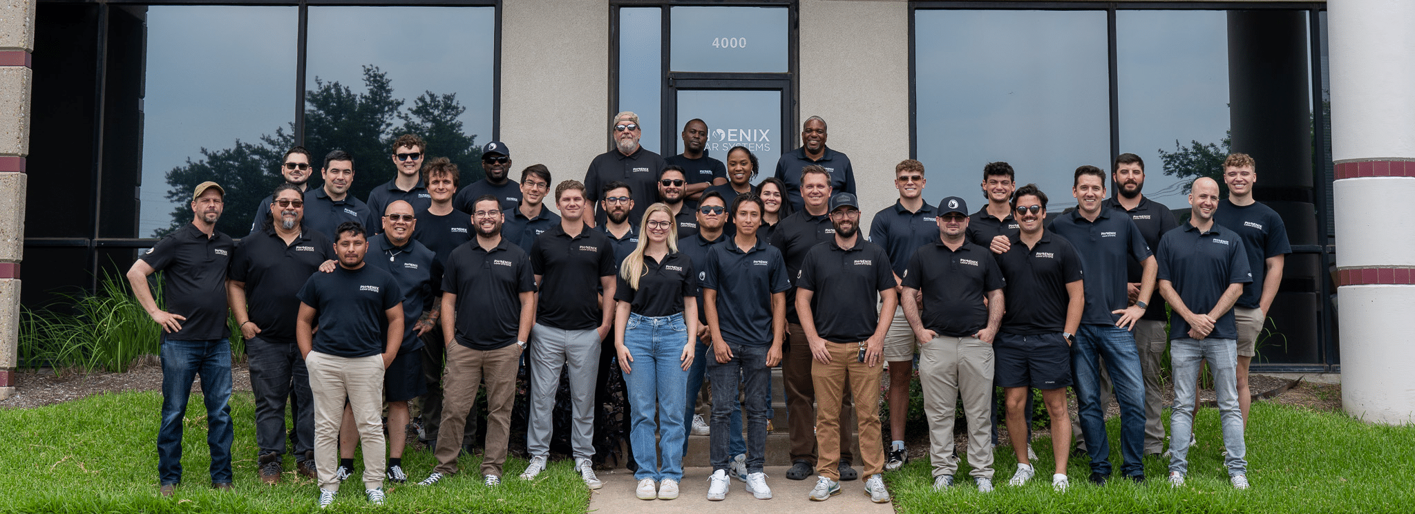 a group of people posing for a photo